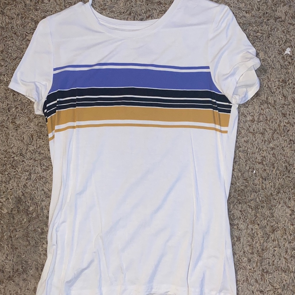 A white with colorful stripes t-shirt from boutique